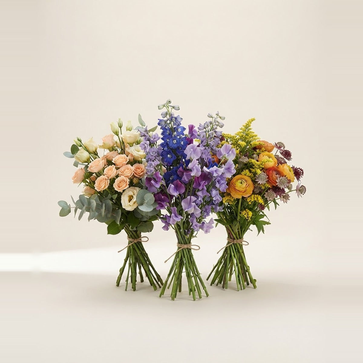 Mixed Colour Flowers — three mixed flower bunches in varied colours loosely tied