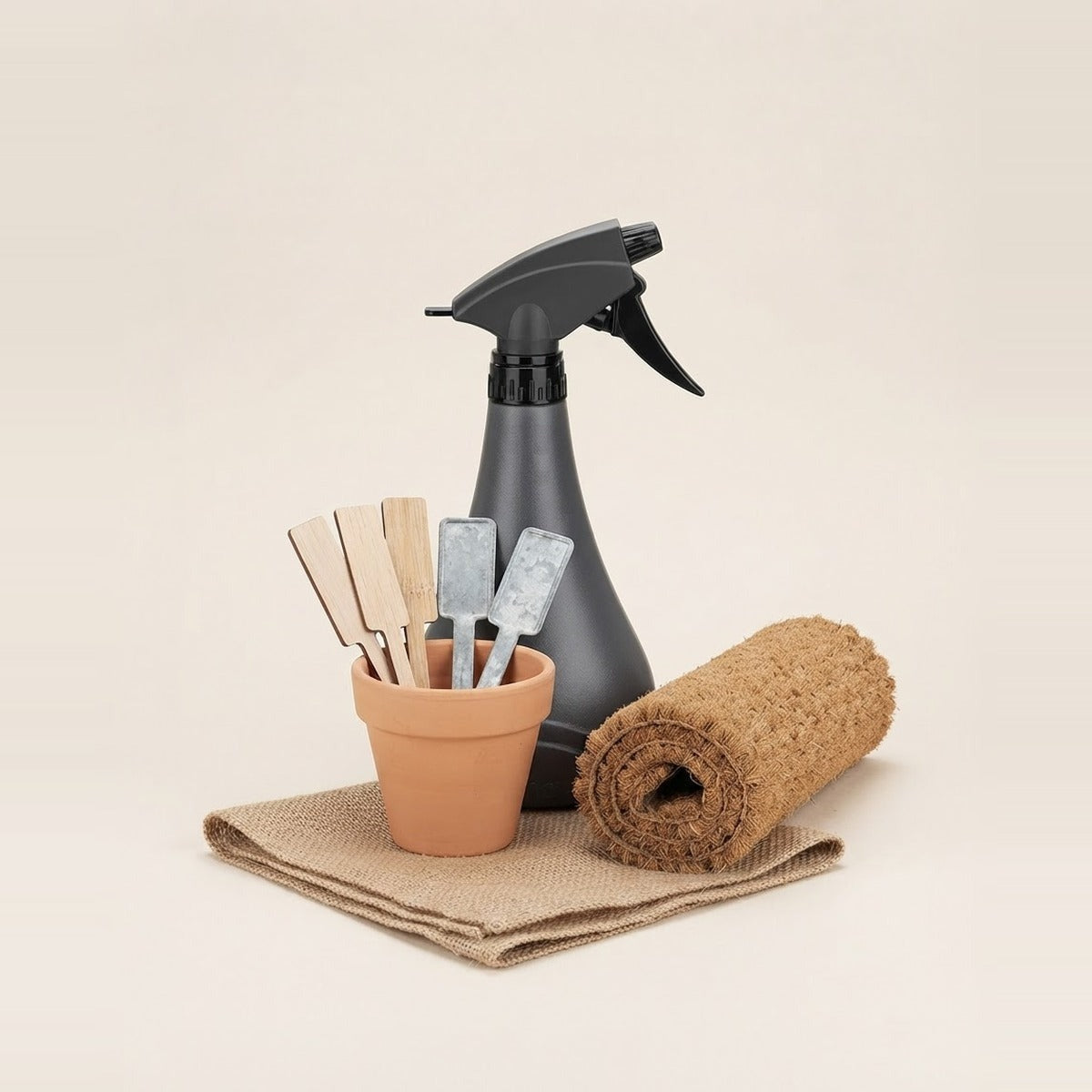Labels, Mats & Garden Extras — garden extras - wooden plant labels, a rolled coir mat, a pair of garden gloves and a small ball of twine