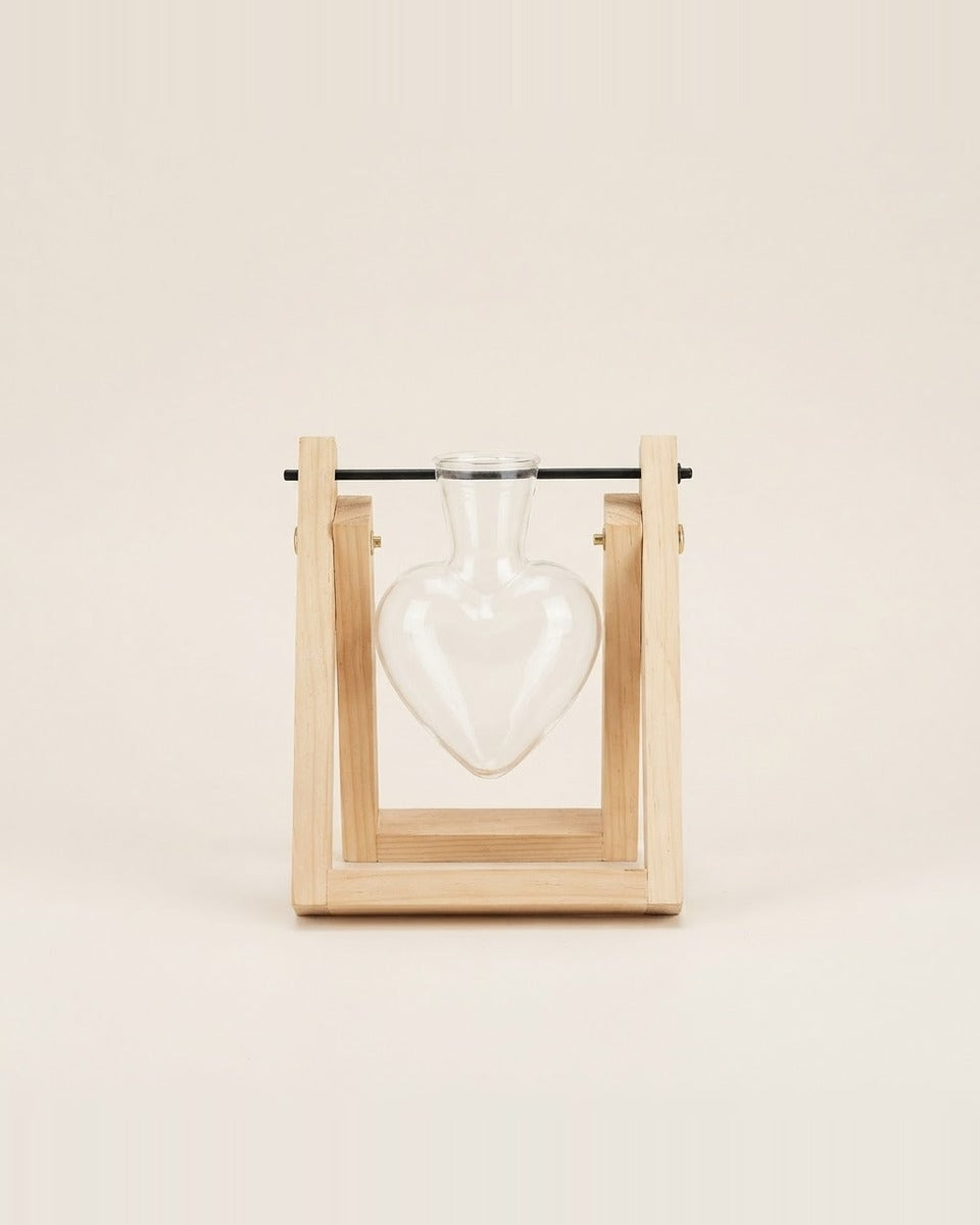 Heart glass vase on natural wood stand مزهرية قلب زجاجية
