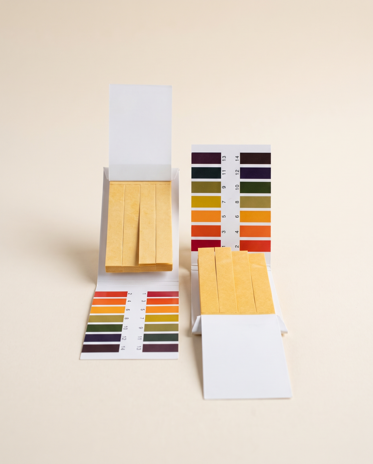 pH test paper strips with printed colour comparison chart
