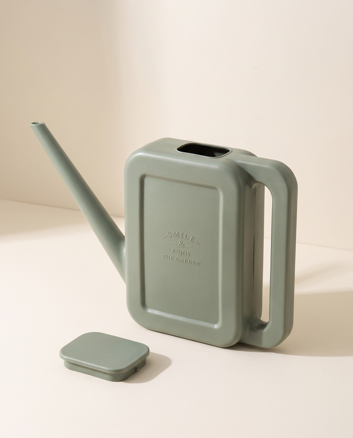 Watering can with lid removed showing filling aperture